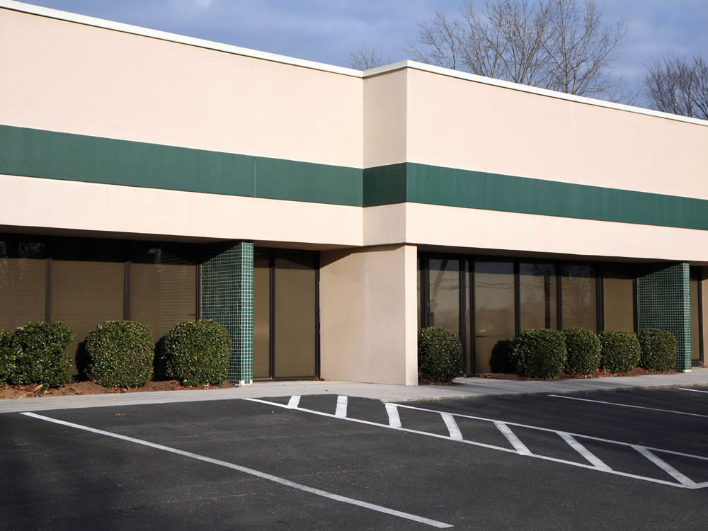 Commercial Exterior Spray Painting By Surface Painters